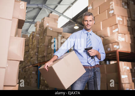 Manager Pacchetto di scansione in magazzino Foto Stock