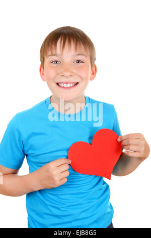 Kid detiene il cuore rosso forma Foto Stock