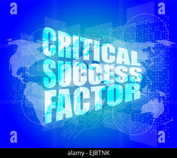Fattore critico di successo di parole sul display digitale con mappa del mondo Foto Stock