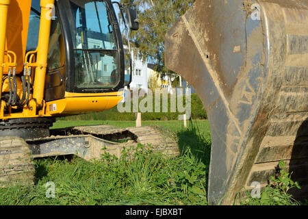 Via ESCAVATORE - BENNA di un escavatore Foto Stock