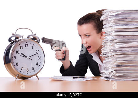 Donna con la pistola sotto stress da scadenze Foto Stock