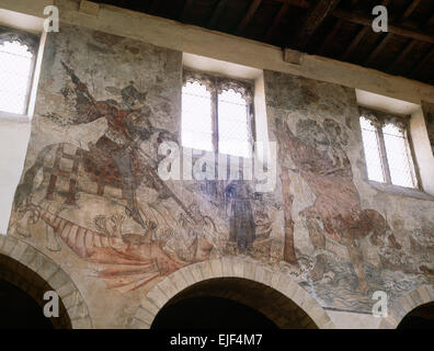 Medievale (1450-60) affreschi nella chiesa di Pickering, North Yorkshire, raffigurante San Giorgio e il drago e San Cristoforo che porta il bambino Gesù. Foto Stock