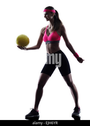 Una donna beach volley player in silhouette silhouette studio isolato su sfondo bianco Foto Stock