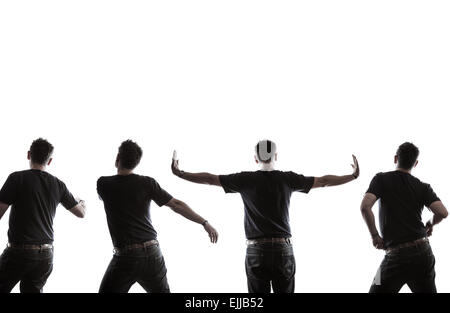 Quattro versioni di uno stesso uomo con spalle alla telecamera in ballo nel vicino-silhouette contro uno sfondo bianco. Immagine composita. Foto Stock