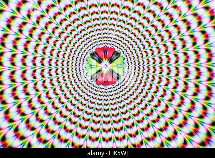 Digitale immagine astratta con un esplosione di blu rosso verde giallo e viola per la produzione di un'illusione ottica di movimento. Foto Stock