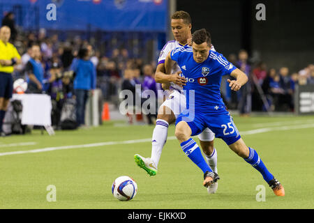 Mar 28, 2015 : Impatto di Montreal defender Donny Toia #25 e Orlando City FC defender Tyler Turner #2 lotta per la palla durante la prima metà di un gioco di MLS tra la città di Orlando FC e l impatto di Montreal al Montreal Olympic Stadium di Montreal, Quebec, Canada. Philippe Bouchard/Cal Sport Media Foto Stock