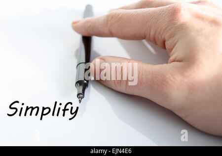 Mano umana la scrittura di semplificare isolate su sfondo bianco - la concezione di business Foto Stock