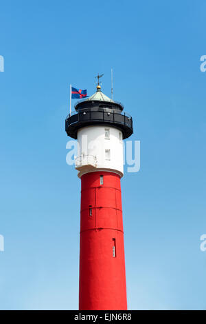 Vecchio classico rosso faro a Wangerooge, Germania, Northsea Foto Stock