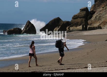 Gli escursionisti sulla spiaggia di Monro Nuova Zelanda Foto Stock