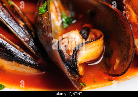 Le cozze in italiano in stile rustico Foto Stock