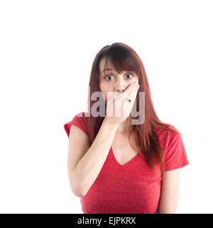 Scioccato la donna che copre la bocca con una sola mano Foto Stock
