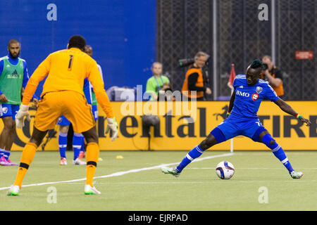 Mar 28, 2015 : Impatto di Montreal in avanti Dominic Oduro #7 blocca la palla durante una partita di MLS tra la città di Orlando FC e l impatto di Montreal al Montreal Olympic Stadium di Montreal, Quebec, Canada. L'impatto di Montreal e la città di Orlando FC legato il gioco 2-2. Philippe Bouchard/Cal Sport Media Foto Stock