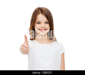 Bambina in carta bianca tshirt mostra thumbsup Foto Stock