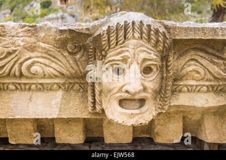 Maschera scolpito a Myra, Provincia di Antalya, regione del Mar Egeo, Turchia Foto Stock