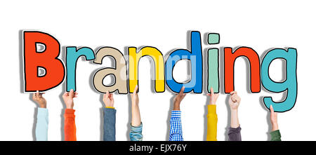 Diverse mani tenendo la parola il branding Foto Stock