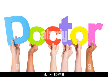 Diverse mani tenendo la parola medico Foto Stock