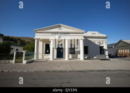 Muratori edificio a Clyde, regione di Otago, Nuova Zelanda. Foto Stock