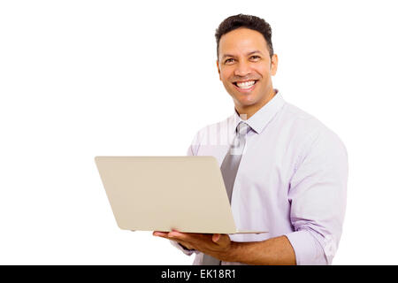 Ritratto di metà uomo di età utilizzando il computer portatile Foto Stock