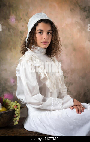 Giovane donna in posa per un vecchio stile ritratto vittoriano Foto Stock