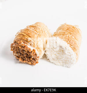 Eclair deliziosi dessert con panna e zucchero a velo Foto Stock