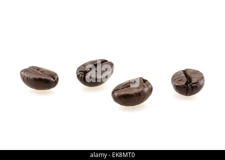 I chicchi di caffè su uno sfondo di legno Foto Stock