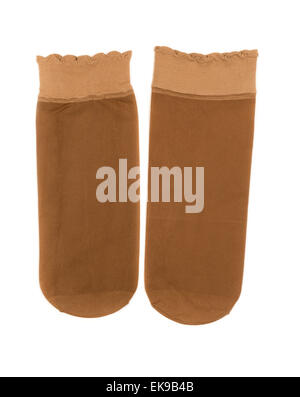 Coppia di beige donna calze di nylon. Isolare il bianco. Foto Stock