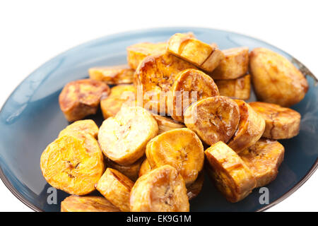 Le banane di caramello giacente su una piastra Foto Stock