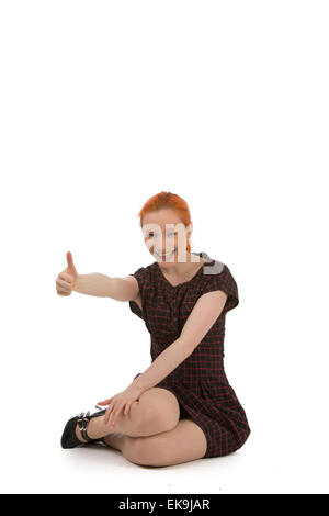 Donna entusiasta di dare un pollice in alto Foto Stock