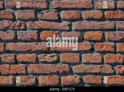 Piastrellabile rosso mattone parete grunge background Foto Stock