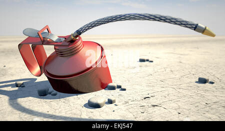 Un normale olio può una desolazione in un arido deserto su un caldo sole di mezzogiorno sfondo Foto Stock