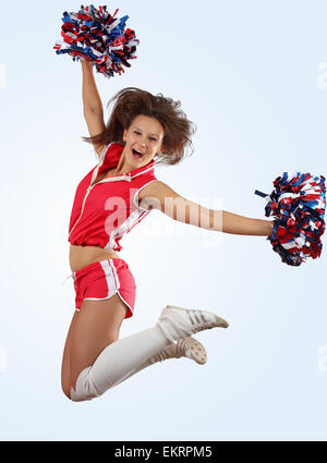 Cheerleader ragazza jumping Foto Stock