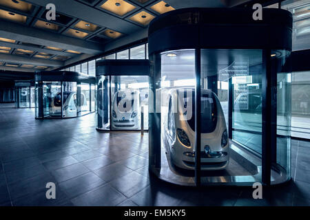 PRT Personal Rapid Transit driverless elettrico auto a Masdar Istituto di Scienza e tecnologia in Abu Dhabi United Arab Emira Foto Stock