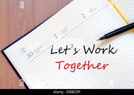 Lavoriamo insieme concetto Notepad Foto Stock
