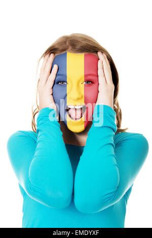 Bandiera della Romania dipinta su una faccia di un giovane uomo Foto stock  - Alamy