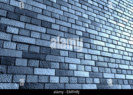Angolo di visualizzazione contro il grigio di un muro di mattoni con luce aggiuntiva da destra Foto Stock
