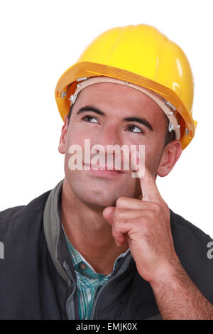 Builder pensando a un'idea Foto Stock