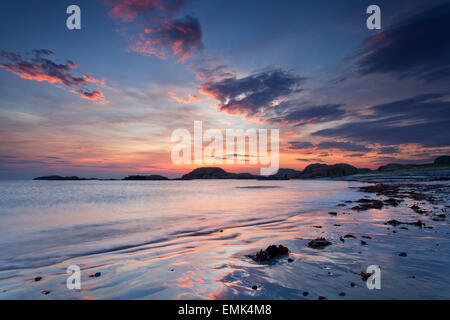 Isola di Iona spiaggia al tramonto Foto Stock