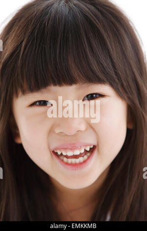 Un grazioso piccolo ragazza sorridente Foto Stock