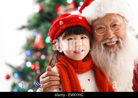 Babbo Natale e la bambina per Natale Foto Stock