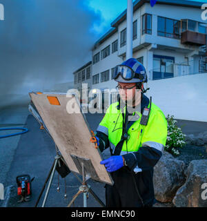 I vigili del fuoco sulla scena di un incendio che coinvolgesse una piccola azienda. Kopavogur, Islanda Foto Stock