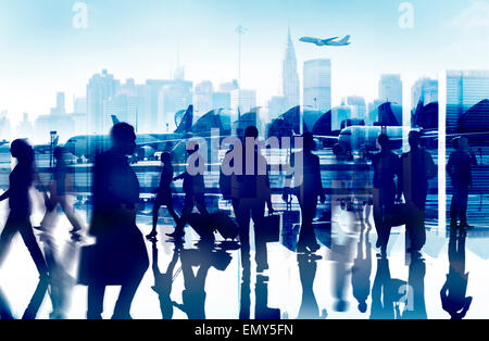 La gente di affari di Viaggio Aeroporto Aziendale terminale passeggeri Concept Foto Stock