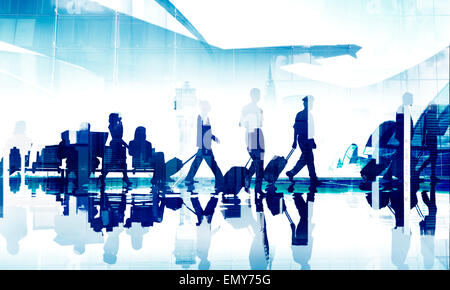 La gente di affari di Viaggio Aeroporto Aziendale terminale passeggeri Concept Foto Stock