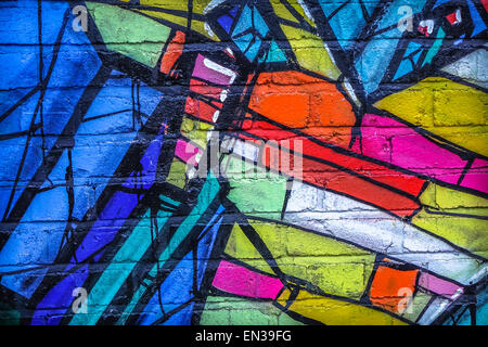 Abstract urban in vetro colorato stile graffiti su un muro di mattoni. Foto Stock