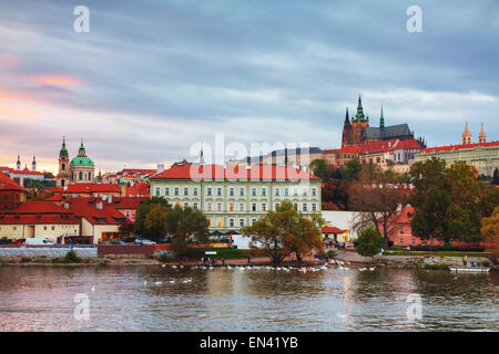 Old Prague cityscape in the evening at sunset Foto Stock