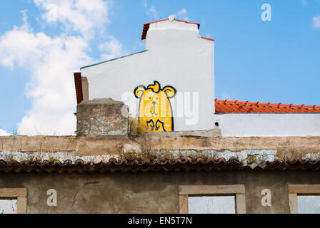 Cartoon graffiti sul muro in Lisbona, Portogallo Foto Stock