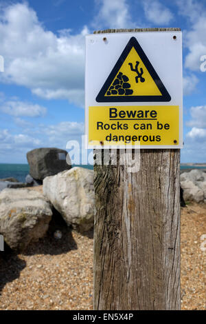 Rocce può essere pericoloso segnale di avvertimento Foto Stock