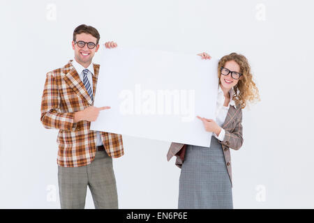 Geeky hipster giovane azienda poster Foto Stock