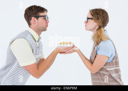 Geeky hipster giovane azienda pasta Foto Stock