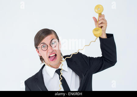 Geeky imprenditore strozzate dal cavo telefonico Foto Stock