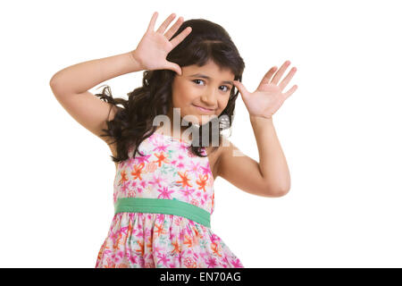 Ragazza facendo una eccitante di faccia Foto Stock